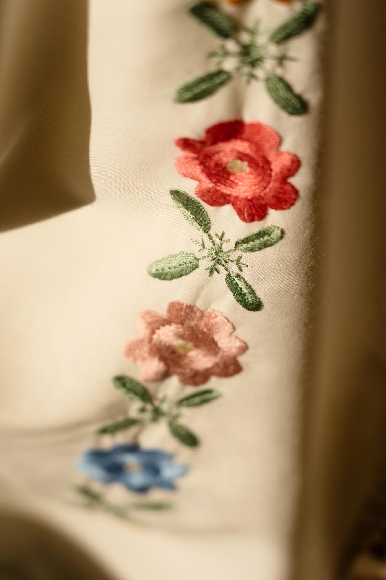 Stitched floral pattern on natural fabric